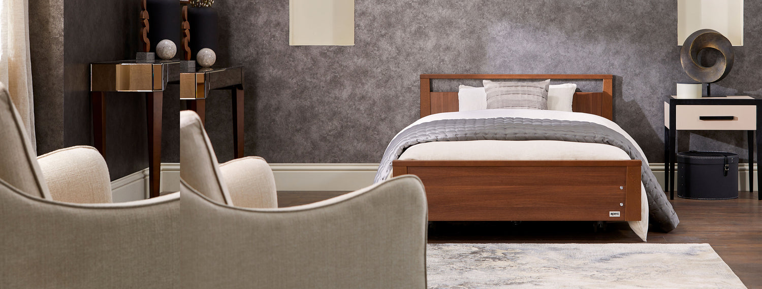Walnut wood finish Opera profiling bed in a modern styled bedroom.