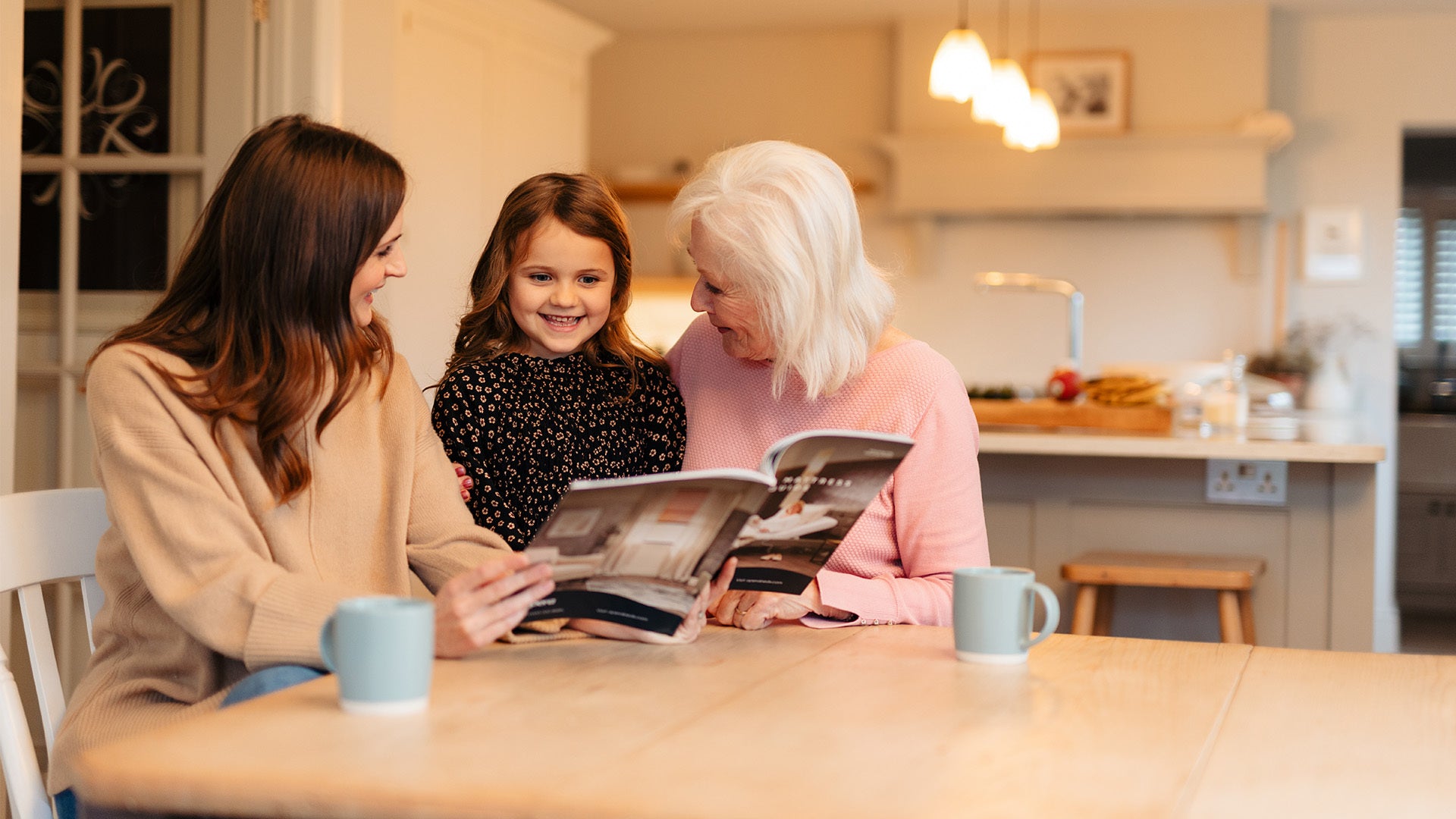 Opera customer journey video showing two women and a little girl looking at an Opera Beds brochure