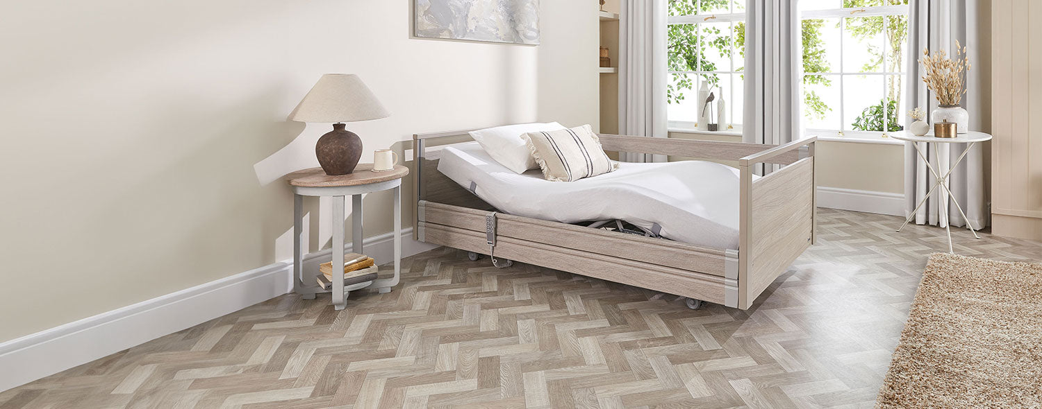 Opera Signature Profiling Bed in a pale wood colour and modern bedroom