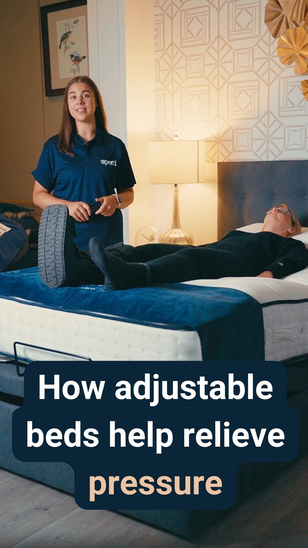 An opera advisor stood next to a lady laid on an adjustable bed with the caption 'How adjustable beds help relieve pressure'