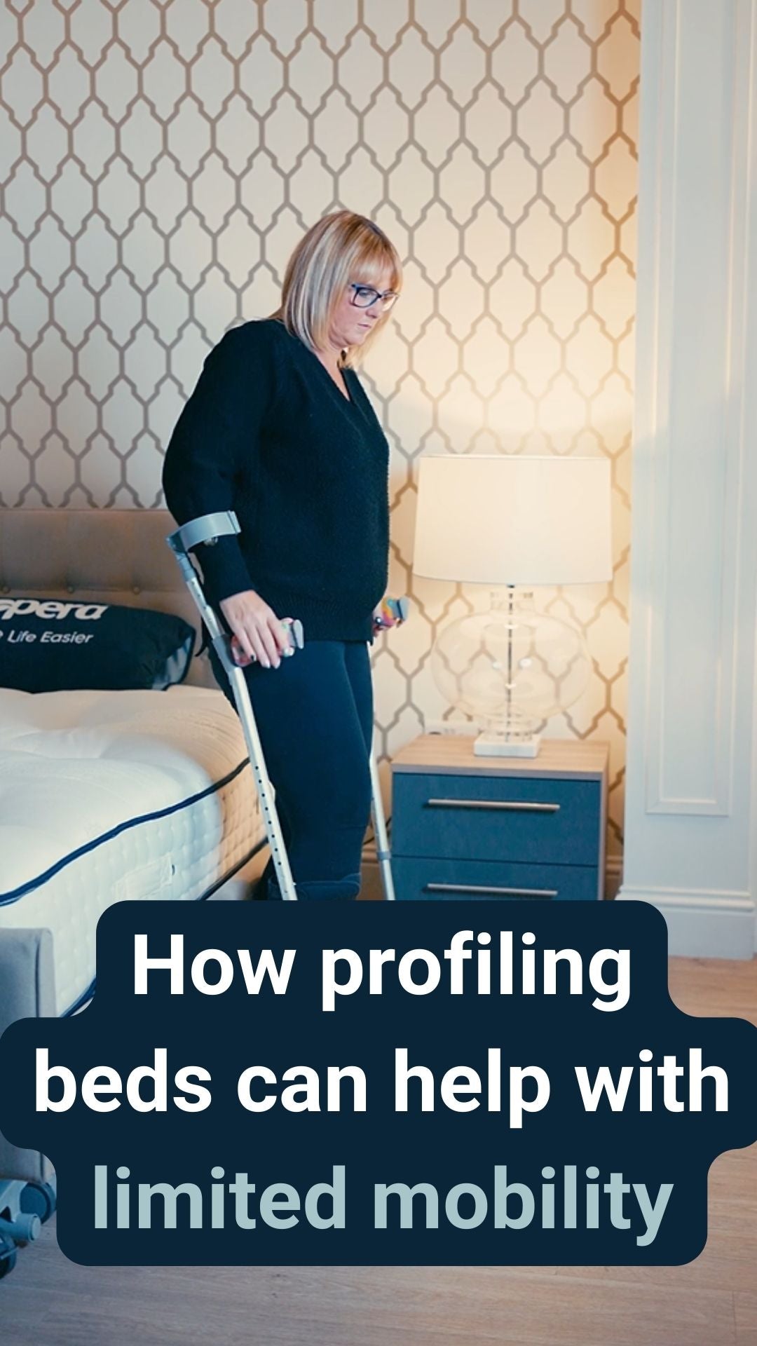 A lady stood next to a profiling bed on crutches with the caption 'How profiling beds can help with limited mobility'