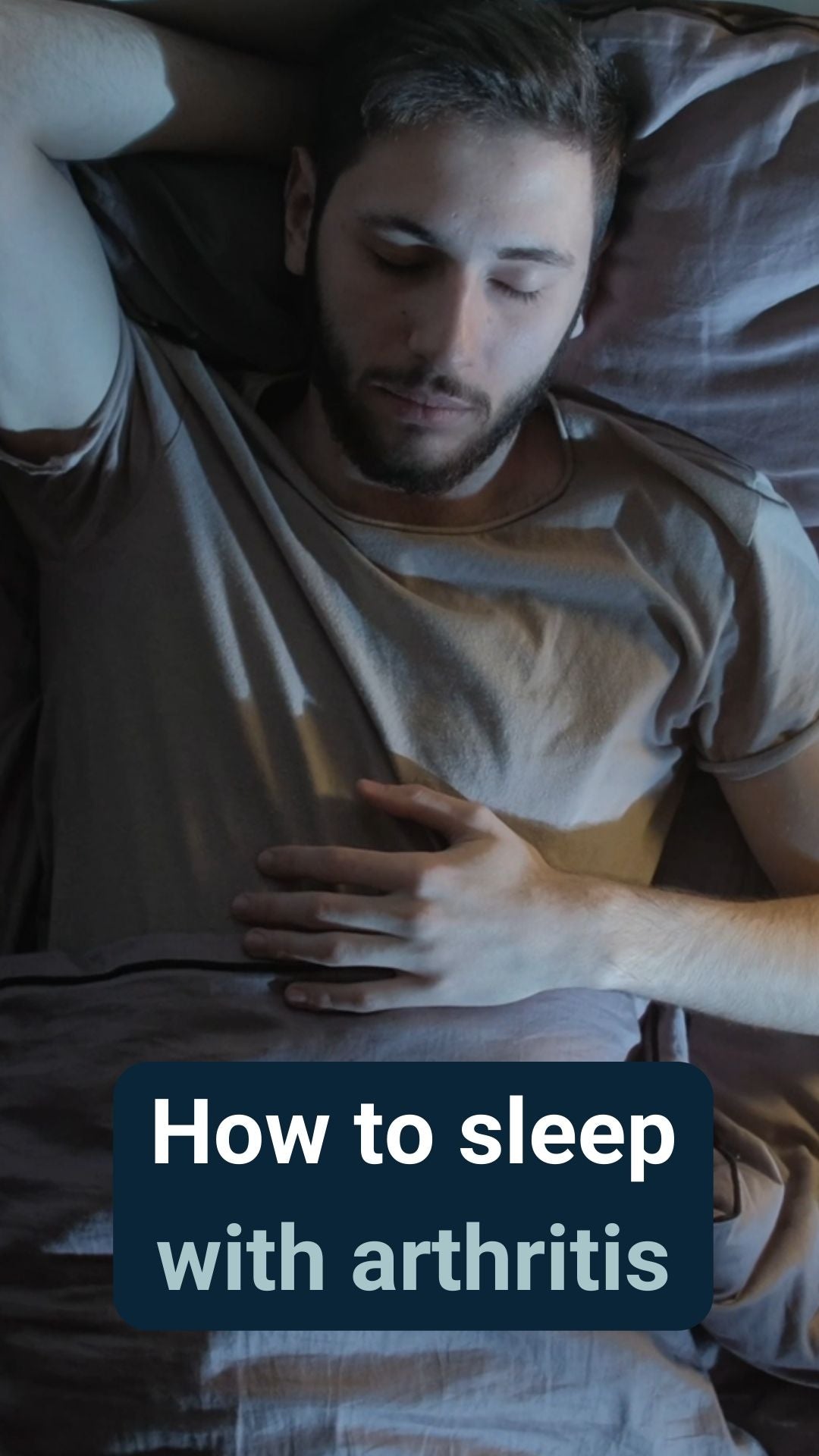 A man asleep in bed at night with the caption 'How to sleep with arthritis'