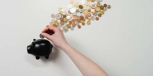 A opened piggy bank with coins 