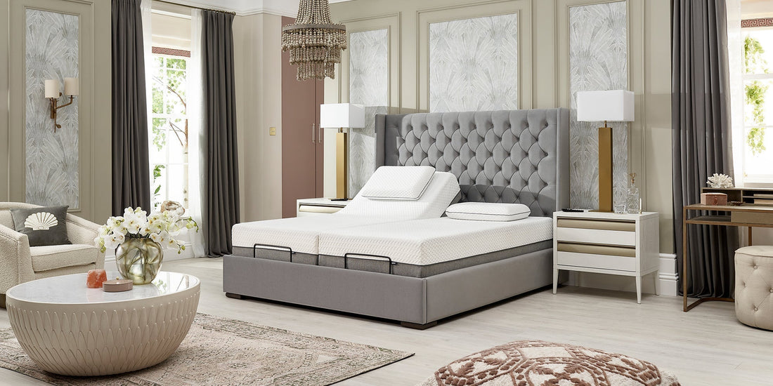 A grey luxury adjustable bed with the left hand side profiled