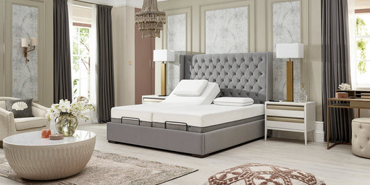 A grey luxury adjustable bed with the left hand side profiled