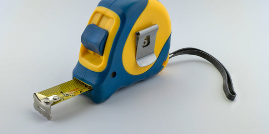 A blue and yellow tape measure