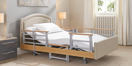A Opera Signature Comfort Plus Profiling bed with split rails