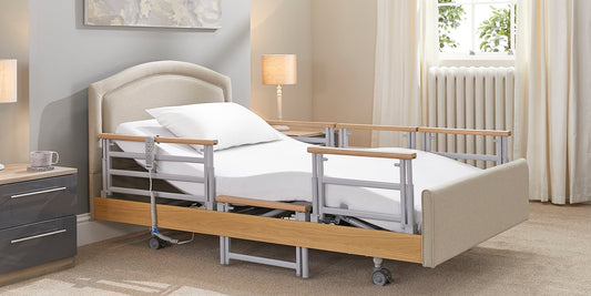 A Opera Signature Comfort Plus Profiling bed with split rails