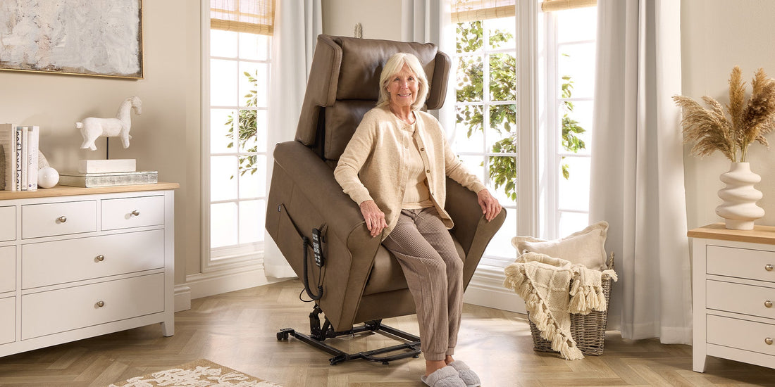 A older lady using the riser feature of an Opera riser recliner chair