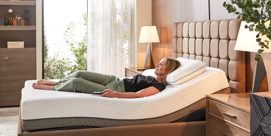 A woman laid in the zero gravity position in an Opera adjustable bed