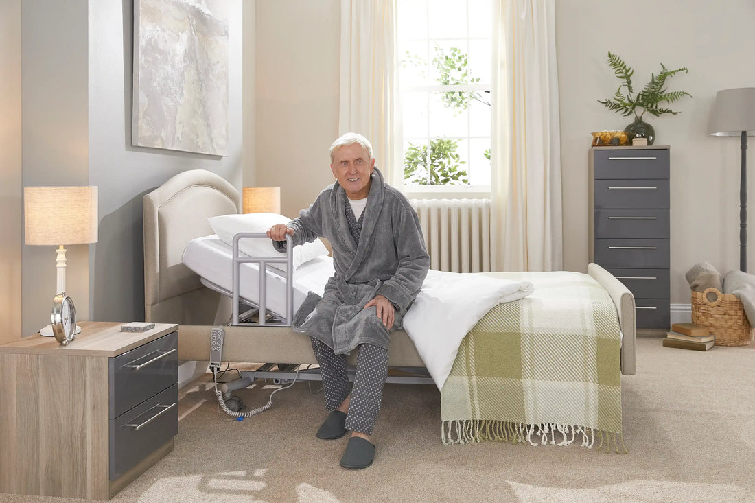 An older gentleman wearing gray pyjamas stretching at the end of his bed