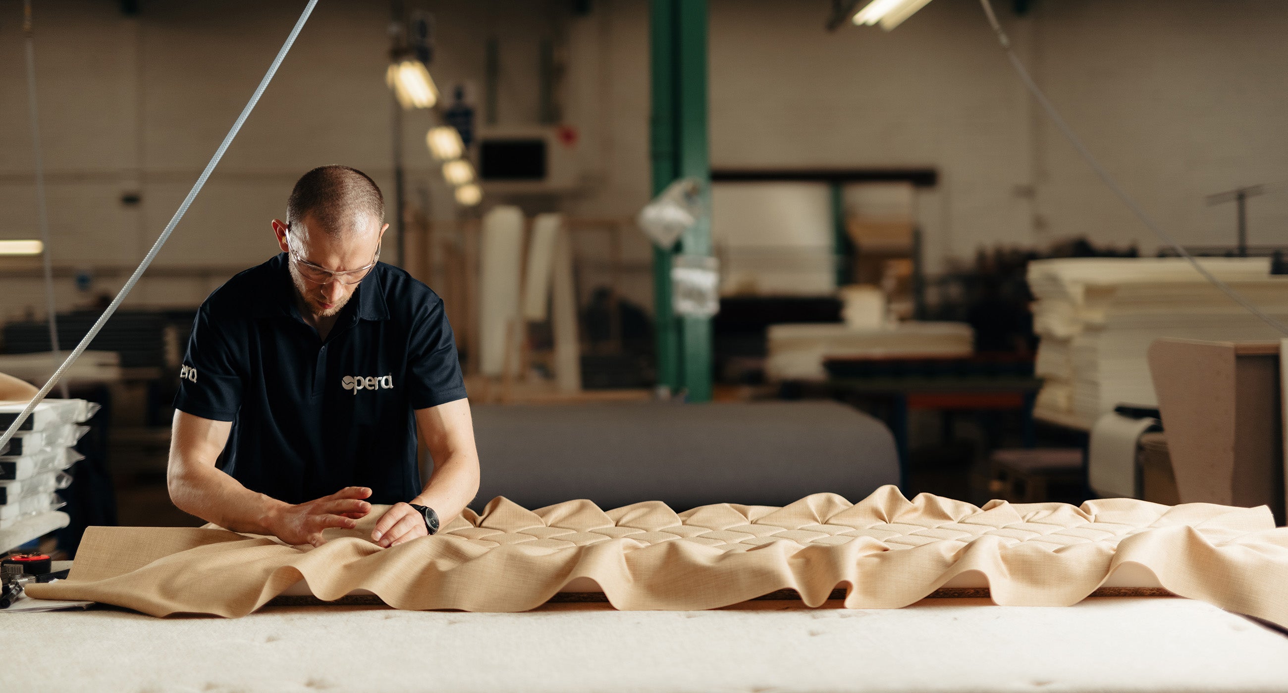 Opera Beds British Manufacturing video showing an Opera employee working with fabric