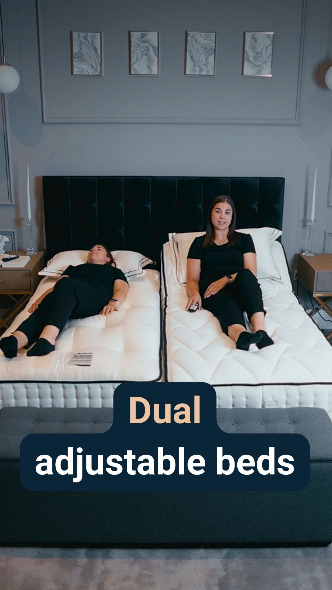 Two women laid on a dual adjustable bed with the caption 'Dual adjustable beds'