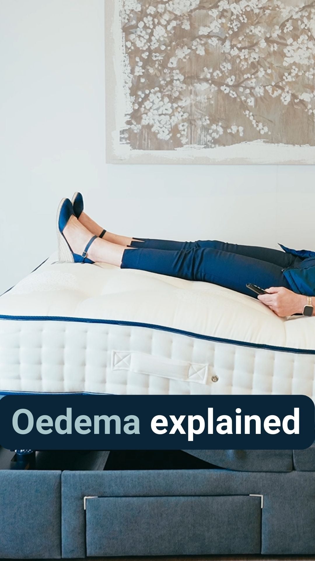 A lady laid on an adjustable bed with her legs elevated with the caption 'Oedema explained'