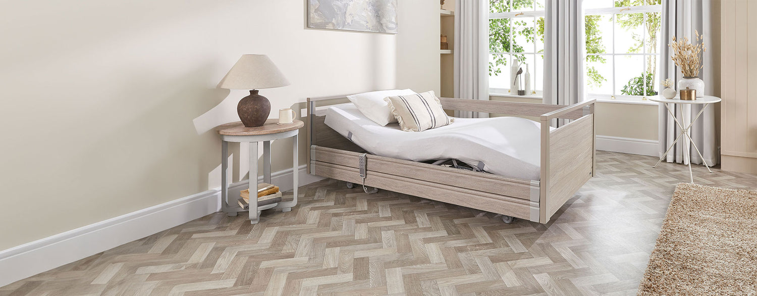 Opera Signature Profiling Bed in a pale wood colour and modern bedroom