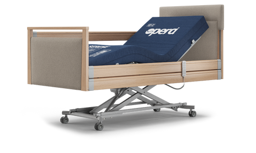 An Opera profiling care bed with it's height adjusted to waist level.