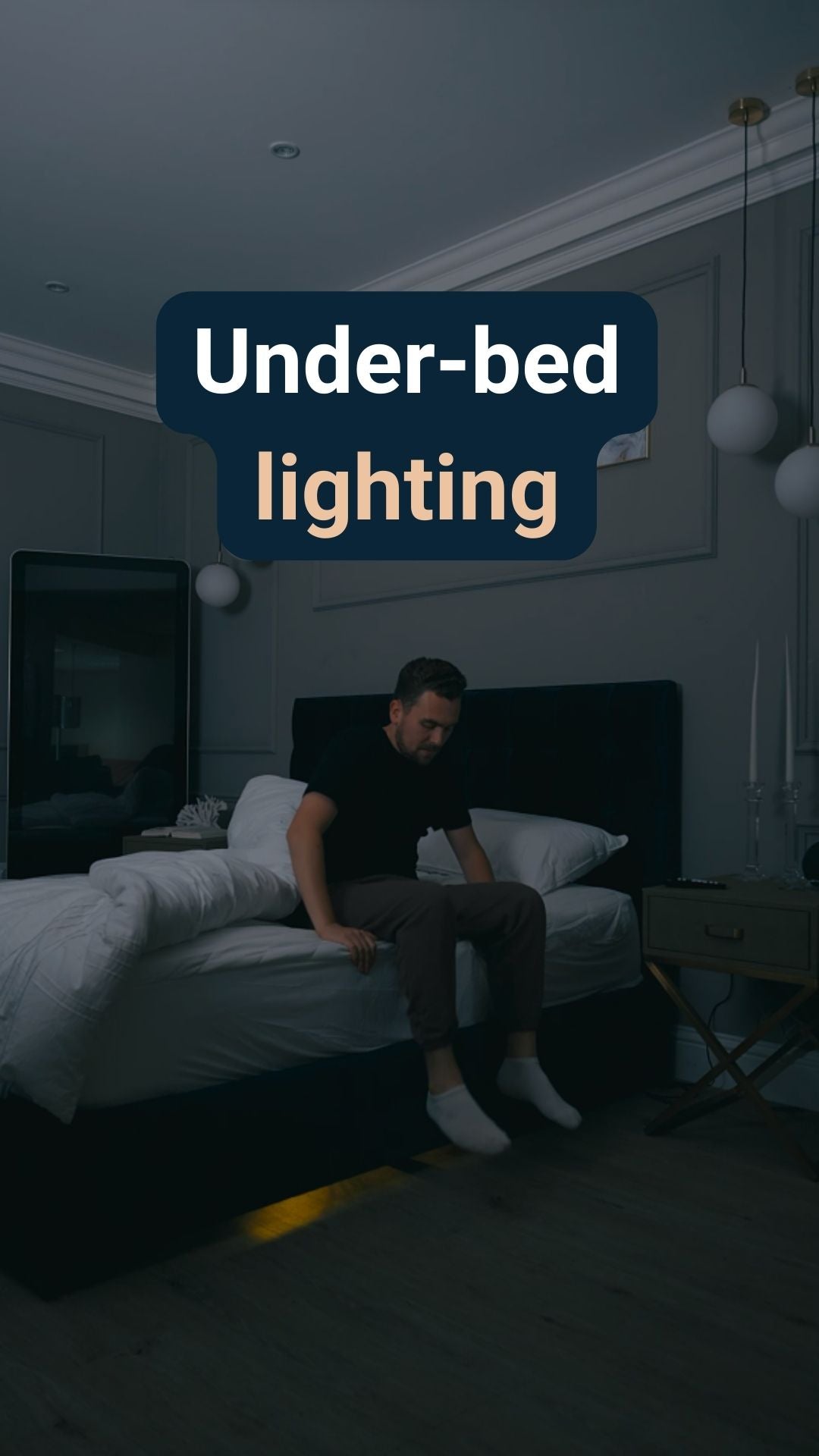 A man getting out of bed with underbed lighting, with the caption 'Under-bed lighting'