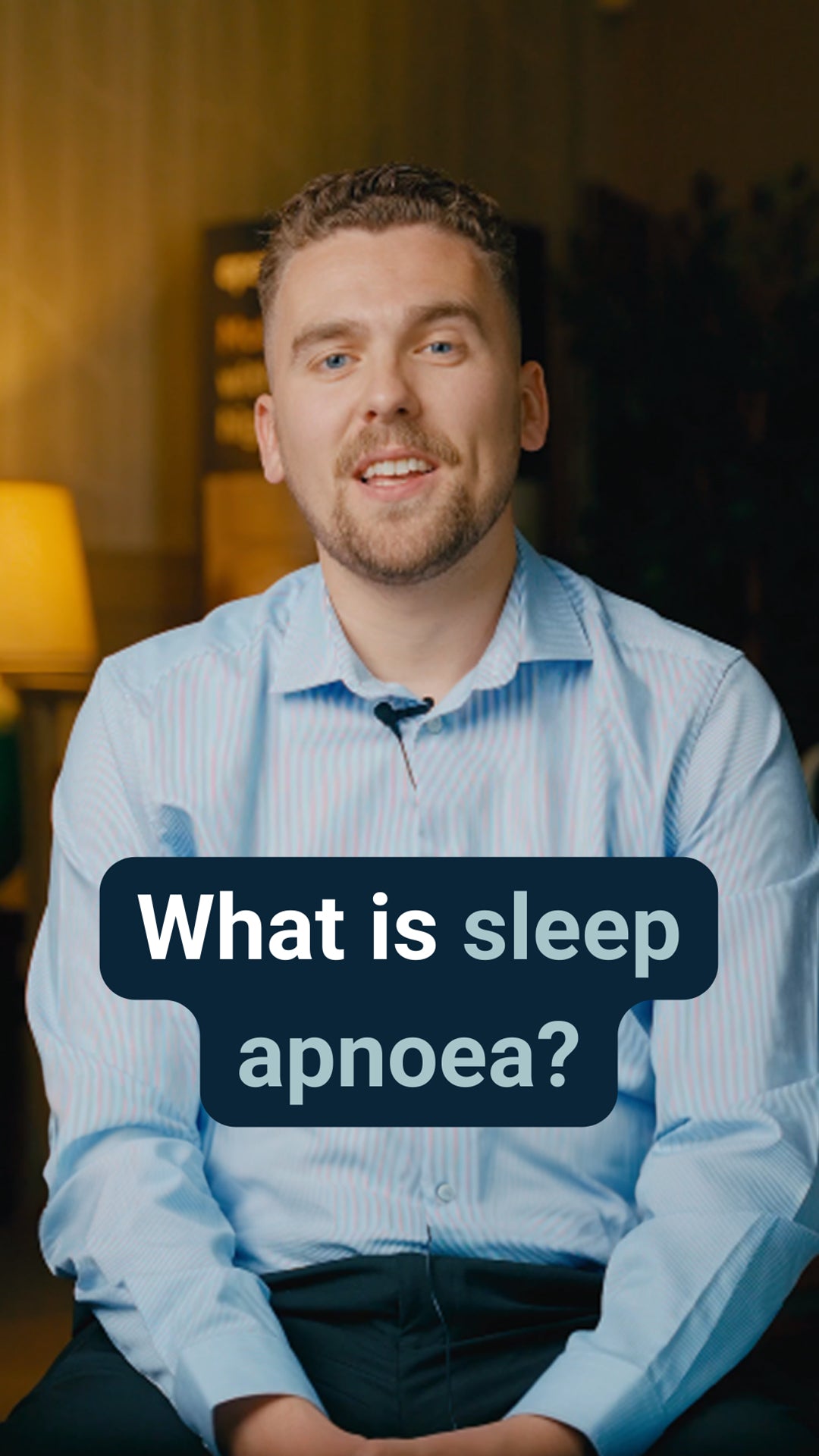 Man in a pale blue shirt with a caption reading: What is sleep apnoea?