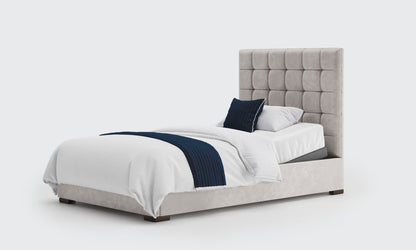 stratton 4ft bed and mattress in the cream velvet material 